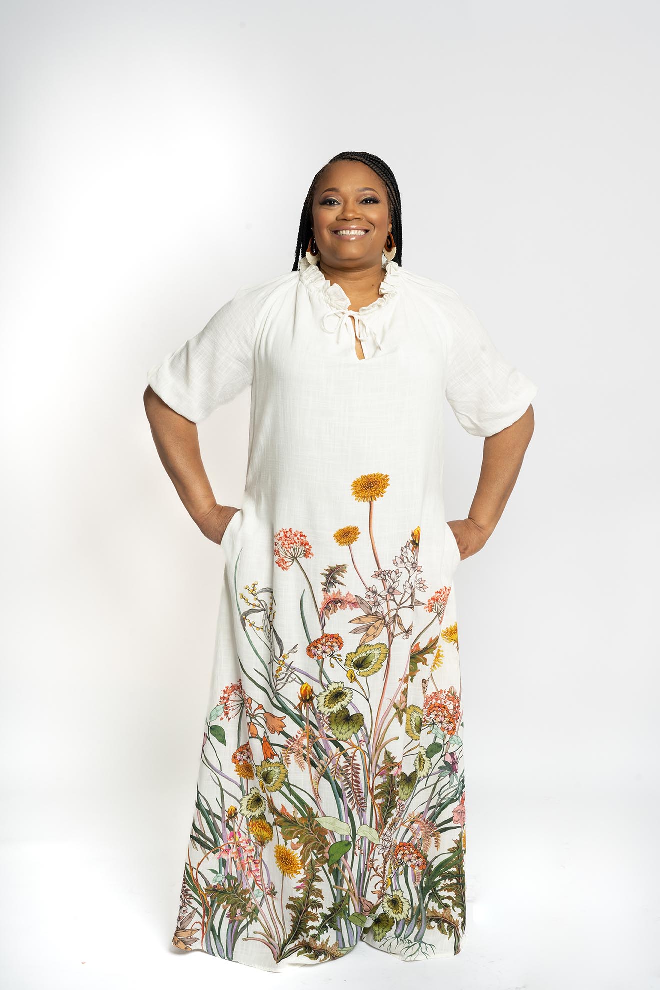 White shirt sitting down photo Darnelle Parker, Intuitive Soul Coach